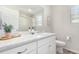 Clean bathroom with a marble countertop and walk-in shower at 237 S Old Hammer St, Aurora, CO 80018