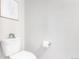 Small bathroom with toilet and pedestal sink at 237 S Old Hammer St, Aurora, CO 80018