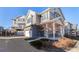 Two-story house with attached garage and front patio at 237 S Old Hammer St, Aurora, CO 80018