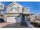 Two-story house with attached garage and landscaped front yard at 237 S Old Hammer St, Aurora, CO 80018