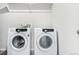Laundry room with Samsung washer and dryer at 237 S Old Hammer St, Aurora, CO 80018