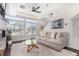 Living room with comfy sofa and a glass coffee table at 237 S Old Hammer St, Aurora, CO 80018
