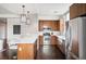 Modern kitchen with stainless steel appliances and island at 2001 Lincoln St # 722, Denver, CO 80202