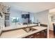 Modern kitchen with stainless steel appliances and a breakfast bar at 10785 W 63Rd Pl # 307, Arvada, CO 80004