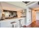 Modern kitchen with stainless steel appliances and a breakfast bar at 10785 W 63Rd Pl # 307, Arvada, CO 80004