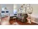 Cozy living room featuring a sectional sofa and home office area at 10785 W 63Rd Pl # 307, Arvada, CO 80004