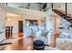 Open living space with a kitchen island, dining area, and loft at 10785 W 63Rd Pl # 307, Arvada, CO 80004
