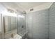 Updated bathroom with a walk-in shower and modern vanity at 2100 N Franklin St # 8, Denver, CO 80205