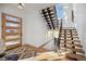 Light and airy entryway with modern staircase and wood flooring at 2650 Zenobia, Denver, CO 80212