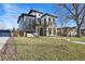 Modern two-story home with landscaped lawn and walkway at 2650 Zenobia, Denver, CO 80212