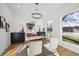 Bright home office with built-in cabinetry and large windows at 2650 Zenobia, Denver, CO 80212
