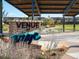 Community park entrance sign with picnic tables nearby at 13923 Vispo Way, Broomfield, CO 80020