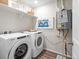 Convenient laundry room with Whirlpool washer and dryer at 13923 Vispo Way, Broomfield, CO 80020