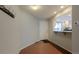 Front entry with terracotta tile floor and view into kitchen at 2972 Shady W Holw, Boulder, CO 80304