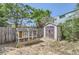 Backyard with a chicken coop, storage shed, and wooden fence at 10021 Miller St, Broomfield, CO 80021