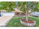 Ranch-style home with mature tree, double garage and circular driveway at 10021 Miller St, Broomfield, CO 80021