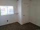 Bright bedroom with carpet, window, and closet at 3228 W Virginia Ave, Denver, CO 80219