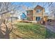 Large backyard with a deck and grassy area at 11615 Masonville Dr, Parker, CO 80134