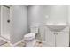 Clean basement bathroom with a toilet and vanity at 11615 Masonville Dr, Parker, CO 80134