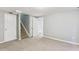 Unfinished basement with carpeted floors and neutral walls at 11615 Masonville Dr, Parker, CO 80134