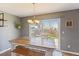 Dining area with farmhouse table and access to backyard at 11615 Masonville Dr, Parker, CO 80134