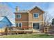 Two-story house with a large deck at 11615 Masonville Dr, Parker, CO 80134