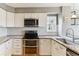 Modern kitchen featuring granite countertops and stainless steel appliances at 11615 Masonville Dr, Parker, CO 80134