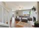 Living area with sectional sofa, fireplace and hardwood floors at 11615 Masonville Dr, Parker, CO 80134
