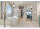 Elegant bathroom with soaking tub, walk-in shower, and modern fixtures at 8827 Gore St, Arvada, CO 80007