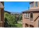 Partial view of community with mountain views in the background at 10515 Ashfield St # 1D, Highlands Ranch, CO 80126