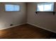 Bright bedroom with hardwood floors and large windows at 370 Fulton St, Aurora, CO 80010