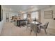 Finished basement with a TV area, dining table, and modern design at 4562 Cattle Cross Trl, Castle Rock, CO 80104