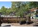 Large backyard with deck, playset, and garden at 433 Beech St, Hudson, CO 80642