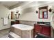 Elegant bathroom with a large soaking tub and double vanity at 6050 Belmont Way, Parker, CO 80134