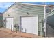 Exterior view of the attached two-car garage at 1915 S Balsam St, Lakewood, CO 80227