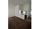 Open living room area with a half bath at 2125 S Telluride Ct, Aurora, CO 80013