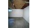 Unfinished basement with concrete floor and exposed ceiling beams at 2125 S Telluride Ct, Aurora, CO 80013
