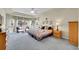 Relaxing main bedroom with bay windows and ceiling fan at 9042 Eldorado Ave, Longmont, CO 80504