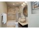 Bathroom with a bathtub, vessel sink, and updated fixtures at 11251 Forest Hills Dr, Parker, CO 80138