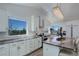 Modern kitchen with granite countertops and island at 11251 Forest Hills Dr, Parker, CO 80138