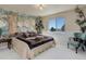 Bedroom with a mural and ample space for a king-size bed at 11251 Forest Hills Dr, Parker, CO 80138