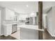 Newly remodeled kitchen, featuring white shaker cabinets and quartz countertops at 1285 S Glencoe St, Denver, CO 80246