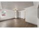 Open living area with hardwood floors and ceiling fan at 4445 Milwaukee St, Denver, CO 80216