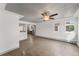 Bright living room with hardwood floors and view into kitchen at 4445 Milwaukee St, Denver, CO 80216