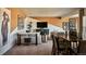 Finished basement with a living area, dining table and bar at 16975 Black Rose Cir, Parker, CO 80134