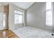 Living room with neutral walls, hardwood and carpet floors at 10297 Royal Eagle St, Highlands Ranch, CO 80129