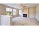 Living room features a fireplace and carpet flooring at 10297 Royal Eagle St, Highlands Ranch, CO 80129