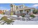 Two-story house with a landscaped yard and attached garage at 7551 Pineridge Trl, Castle Pines, CO 80108