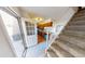 Entryway with view of kitchen, stairs, and sliding glass door to patio at 2935 W 81St Ave # D, Westminster, CO 80031