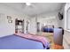 Bright bedroom with hardwood floors and mirrored closet doors at 500 E 11Th Ave # 402, Denver, CO 80203